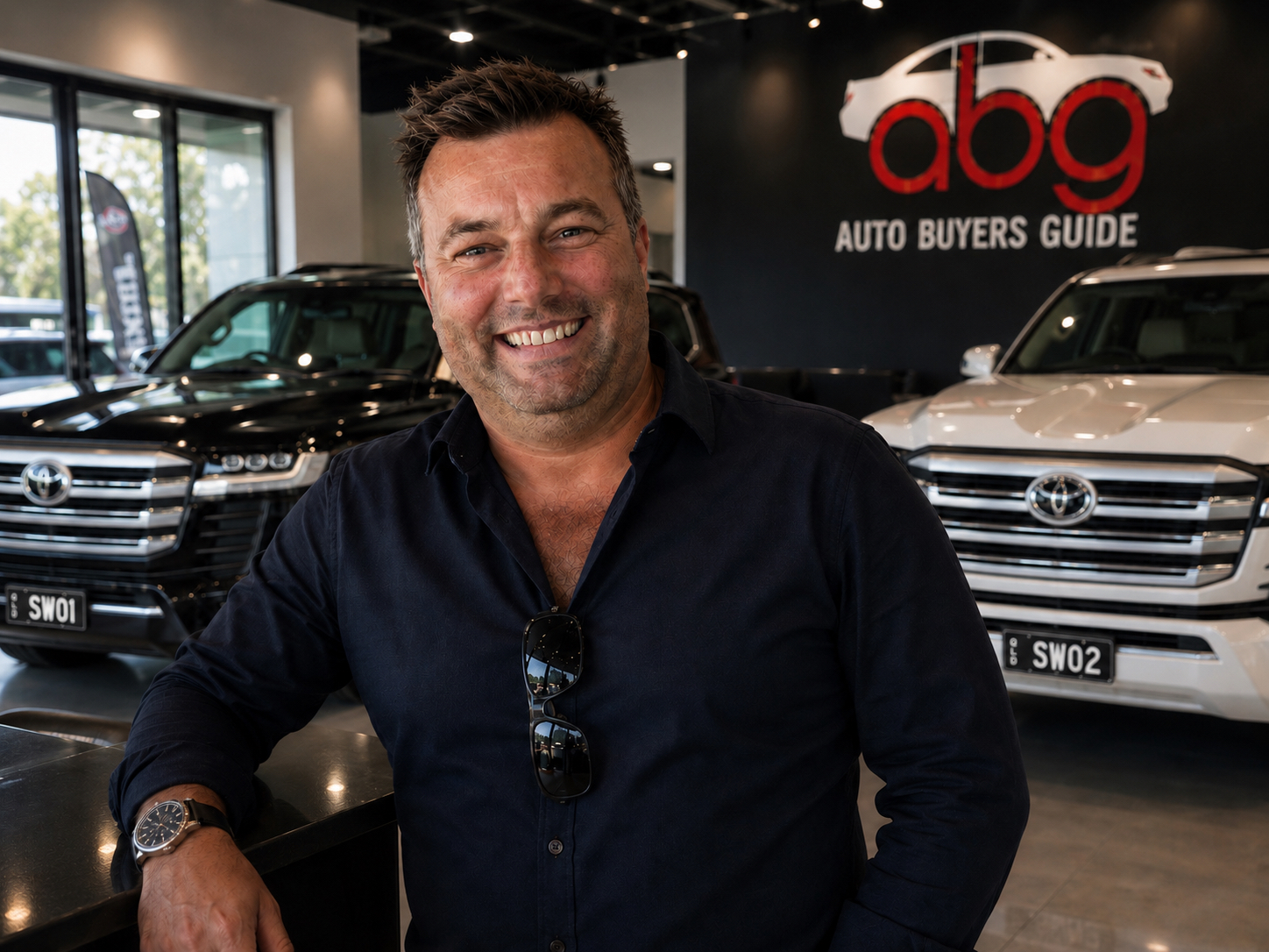Auto Buyers Guide founder at the dealership